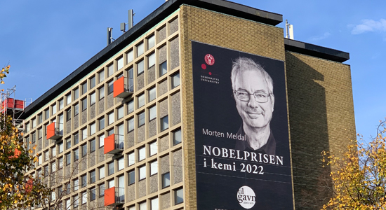 Nobel prize winner 2022 on banner on te side of our building